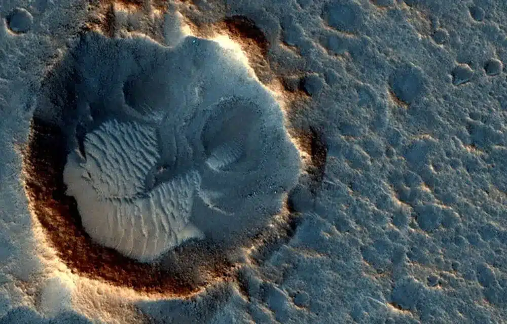 Discovery of Liquid Water on Mars